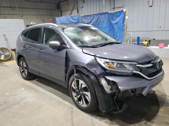 Photo 4 from auction – 2016 HONDA CR-V TOURI with VIN 5J6RM4H99GL122381