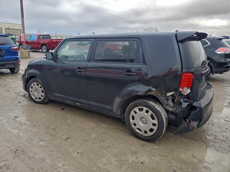 Photo 2 from auction – 2014 TOYOTA SCION with VIN JTLZE4FE4EJ057228
