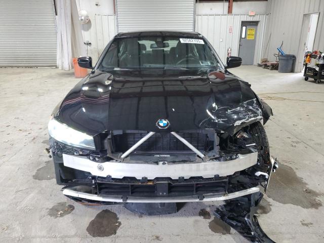 Photo 5 from auction – 2023 BMW 330XI with VIN 3MW89FF05P8C80983