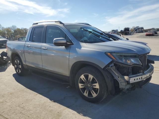 Photo 4 from auction – 2017 HONDA RIDGELINE with VIN 5FPYK2F52HB002011