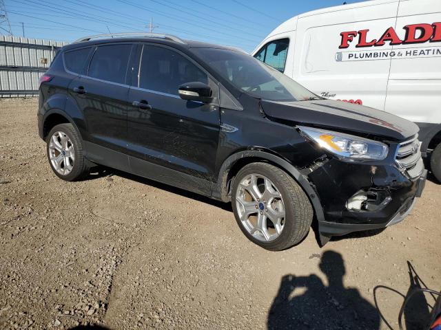Photo 4 from auction – 2018 FORD ESCAPE TIT with VIN 1FMCU9J92JUC85518