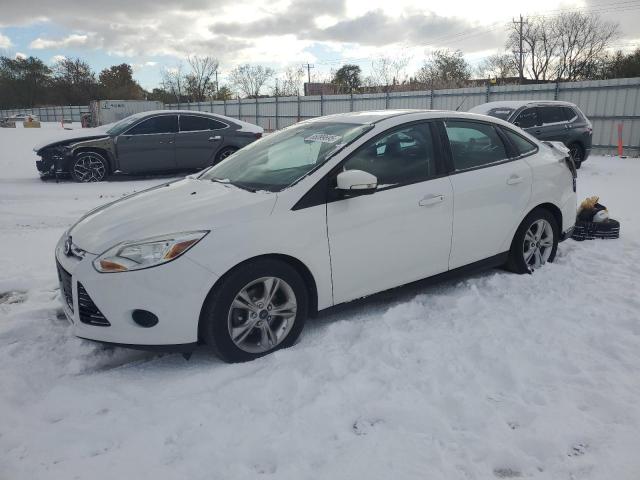 FORD FOCUS SE 2014 with VIN 1FADP3F20EL431991 - Photo from auction