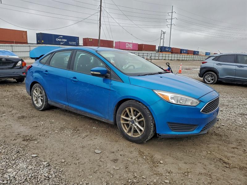Photo 4 from auction – 2016 FORD FOCUS SE with VIN 1FADP3F25GL243020