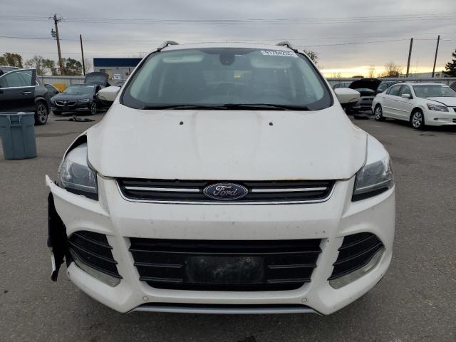 Foto 5 de la subasta – 2014 FORD ESCAPE TIT con VIN 1FMCU9J98EUB52896