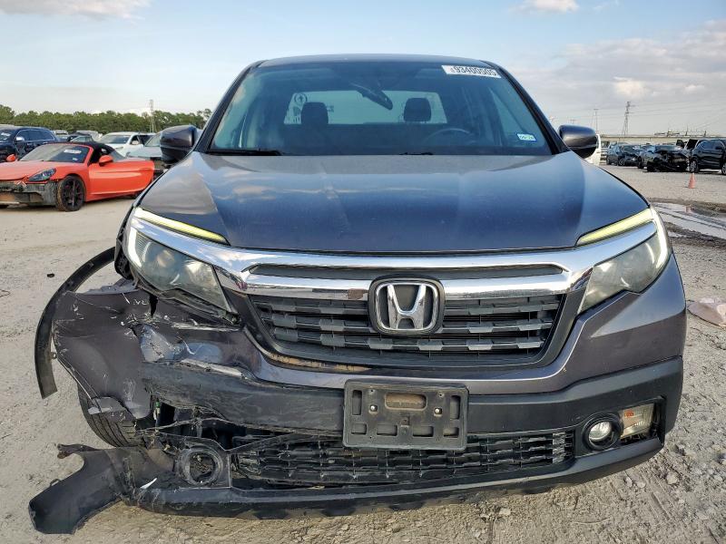 Photo 5 from auction – 2017 HONDA RIDGELINE with VIN 5FPYK2F60HB002730