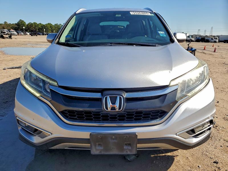 Photo 5 from auction – 2016 HONDA CR-V EXL with VIN 2HKRM3H70GH535356