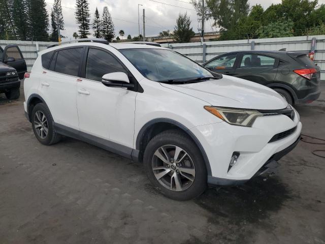 Photo 4 from auction – 2018 TOYOTA RAV4 with VIN 2T3WFREV4JW516764