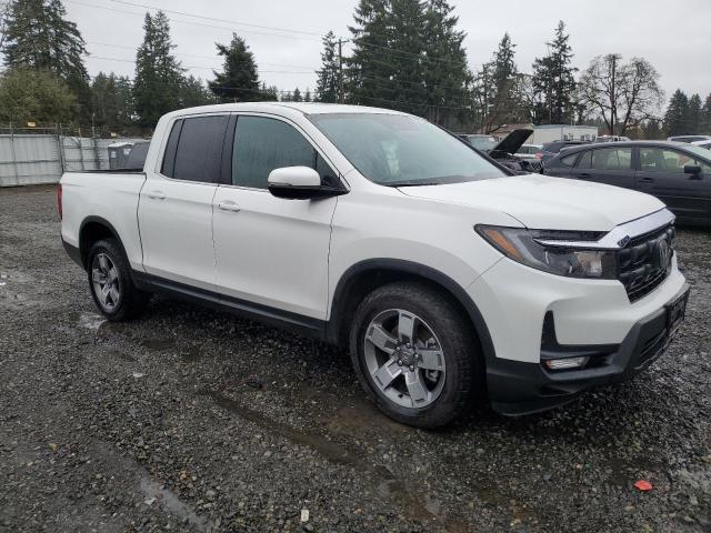 Photo 4 from auction – 2024 HONDA RIDGELINE with VIN 5FPYK3F59RB001722