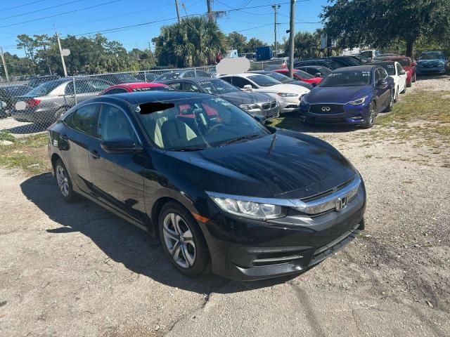 HONDA CIVIC LX 2018 with VIN 19XFC2F52JE029461 - Photo from auction