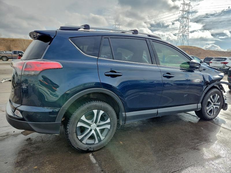 Photo 3 from auction – 2017 TOYOTA RAV4 LE with VIN JTMBFREV6HJ107527