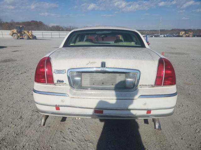 Photo 6 from auction – 2004 LINCOLN TOWN CAR E with VIN 1LNHM81W94Y619062