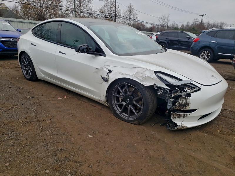 Photo 4 from auction – 2021 TESLA MODEL 3 with VIN 5YJ3E1EB3MF919206