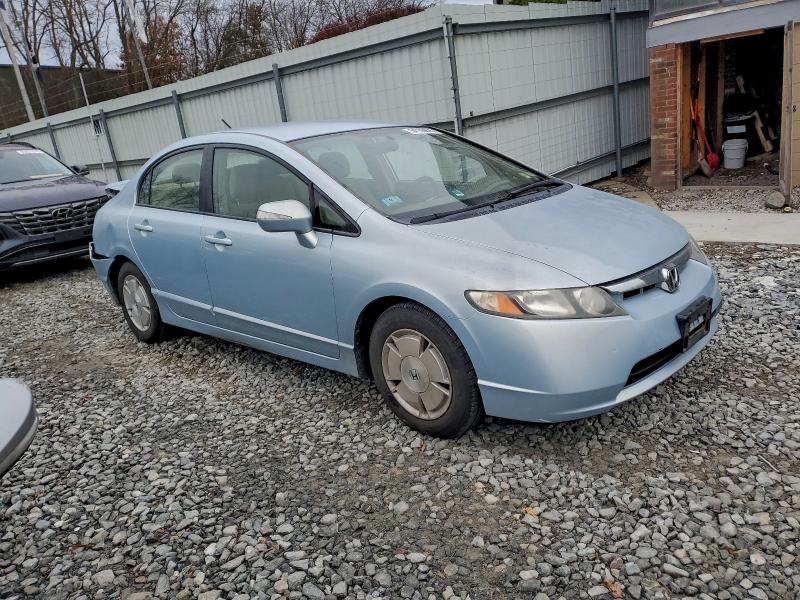 Photo 4 from auction – 2006 HONDA CIVIC HYBR with VIN JHMFA36216S021503