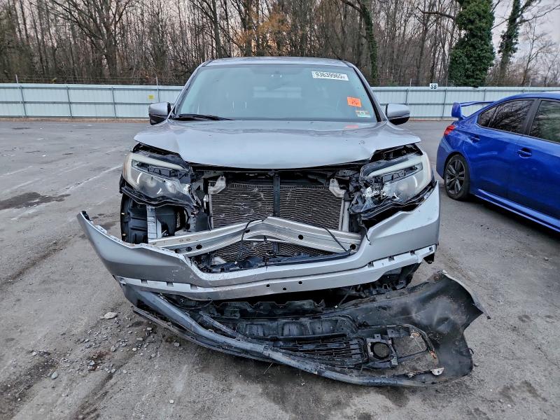 Photo 5 from auction – 2017 HONDA RIDGELINE with VIN 5FPYK3F65HB034109