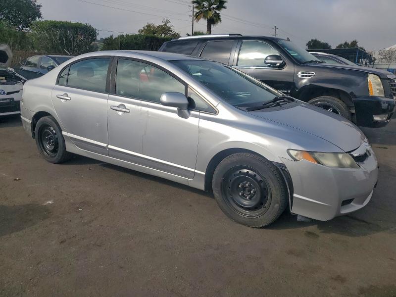 Photo 4 from auction – 2010 HONDA CIVIC LX with VIN 19XFA1E56AE039668