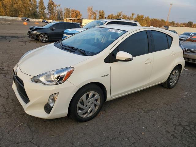 TOYOTA PRIUS C 2015 with VIN JTDKDTB37F1102226 - Photo from auction