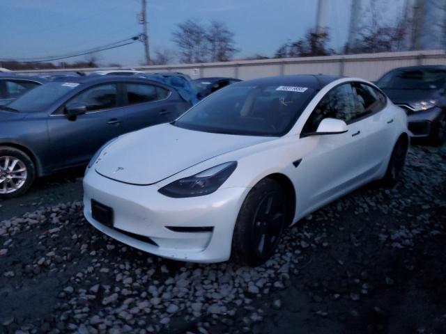 TESLA MODEL 3 2023 with VIN 5YJ3E1EA3PF585657 - Photo from auction