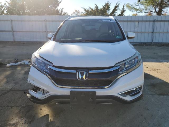 Photo 5 from auction – 2016 HONDA CR-V EXL with VIN 5J6RM4H76GL107772