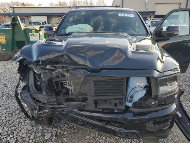 Photo 11 from auction – 2023 RAM 1500 LARAM with VIN 1C6SRFJM8PN550490