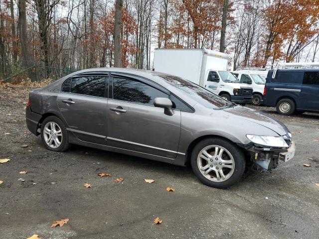Foto 4 de la subasta – 2011 HONDA CIVIC LX con VIN 19XFA1F56BE040495