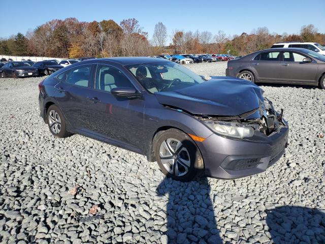 Photo 4 from auction – 2016 HONDA CIVIC LX with VIN 2HGFC2F54GH507460