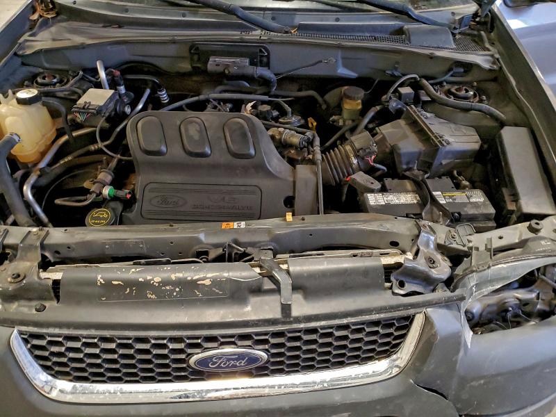 Photo 12 from auction – 2003 FORD ESCAPE XLT with VIN 1FMYU93133KB77453