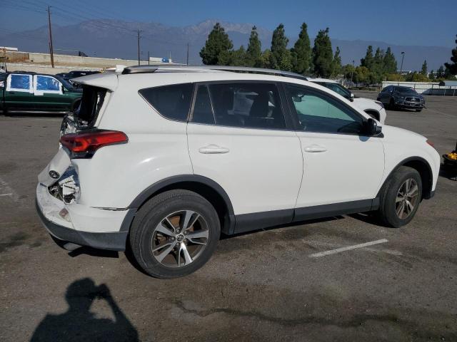 Photo 3 from auction – 2016 TOYOTA RAV4 XLE with VIN 2T3WFREV6GW267201
