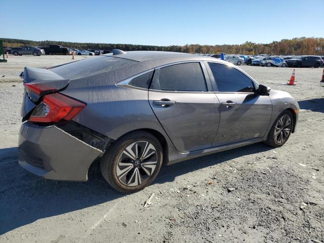Photo 3 from auction – 2018 HONDA CIVIC with VIN JHMFC1F41JX025739