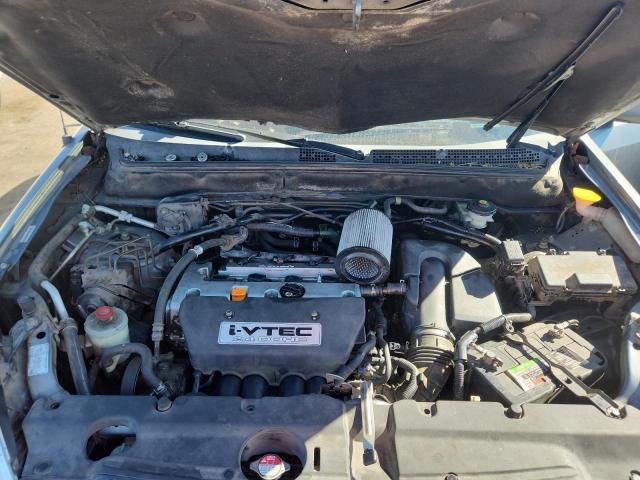 Photo 12 from auction – 2005 HONDA CR-V SE with VIN JHLRD78975C061619