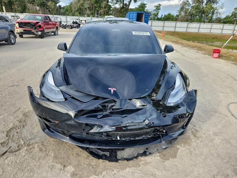 Photo 5 from auction – 2022 TESLA MODEL 3 with VIN 5YJ3E1EA5NF329808