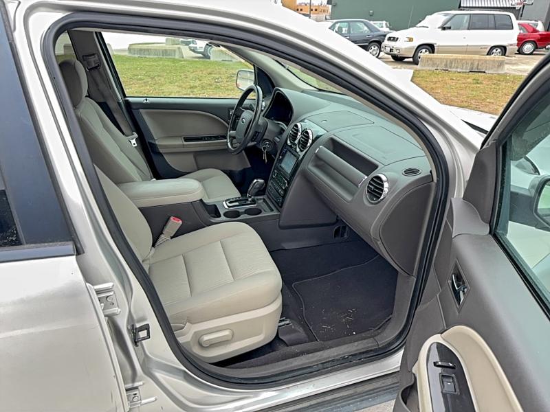 Photo 5 from auction – 2008 FORD TAURUS X S with VIN 1FMDK02W08GA09308