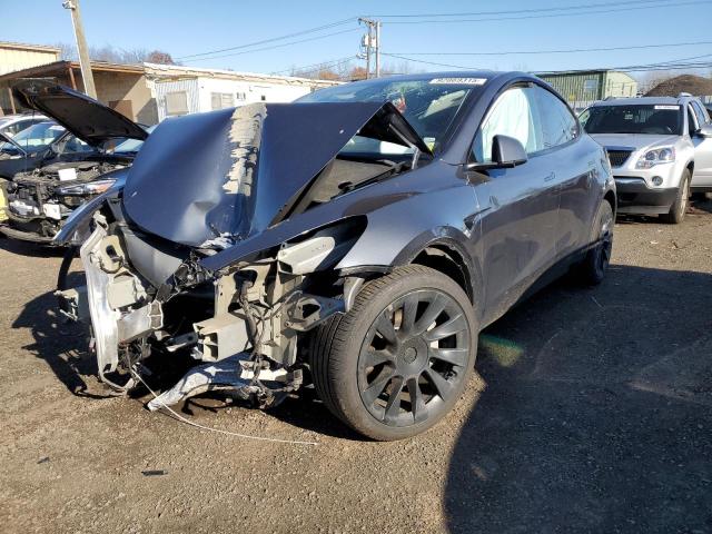 TESLA MODEL Y 2022 с VIN 7SAYGAEE7NF388056 - Фото с аукциона