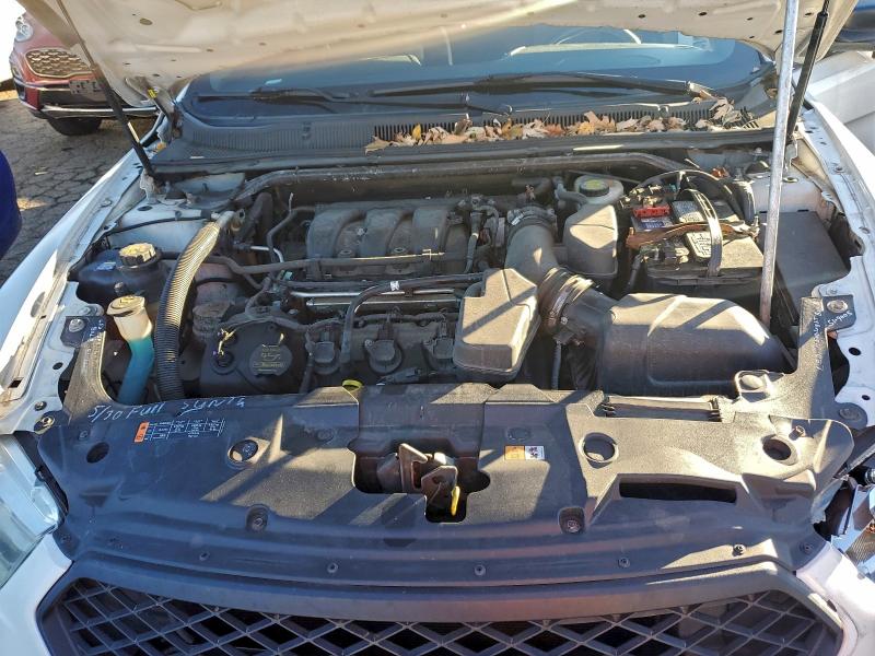 Photo 11 from auction – 2013 FORD TAURUS POL with VIN 1FAHP2M83DG144901