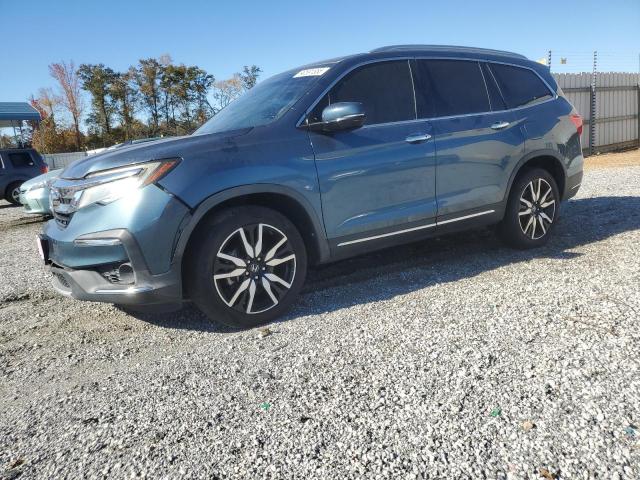 HONDA PILOT ELIT 2019 with VIN 5FNYF6H08KB035284 - Photo from auction