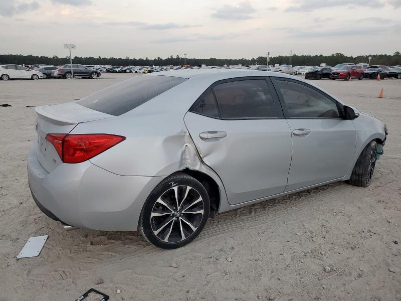 Photo 3 from auction – 2018 TOYOTA COROLLA L with VIN 5YFBURHE3JP779211