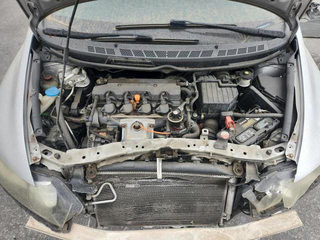 Photo 11 from auction – 2011 HONDA CIVIC LX with VIN 19XFA1F57BE033555