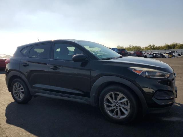 Photo 4 from auction – 2016 HYUNDAI TUCSON SE with VIN KM8J23A45GU153957