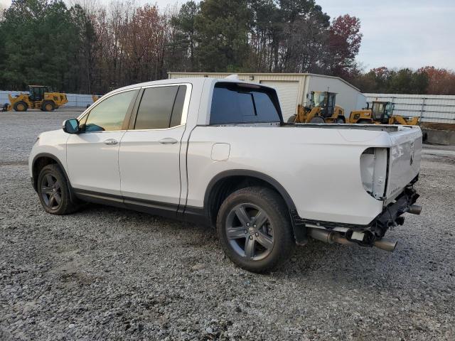 Photo 2 from auction – 2023 HONDA RIDGELINE with VIN 5FPYK3F52PB058308