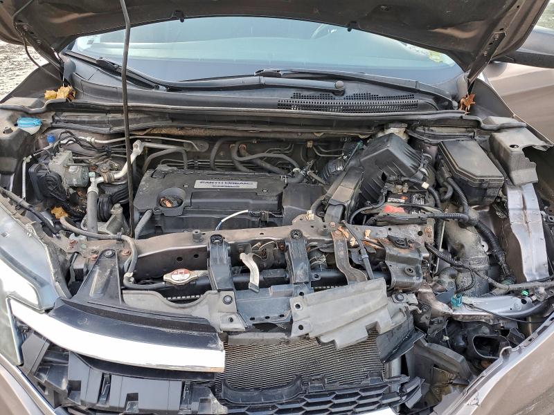 Photo 12 from auction – 2015 HONDA CR-V LX with VIN 3CZRM3H38FG712962