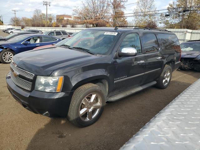 CHEVROLET SUBURBAN K 2011 with VIN 1GNSKKE33BR298566 - Photo from auction