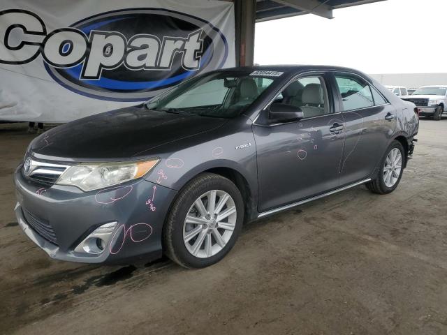 TOYOTA CAMRY HYBR 2013 with VIN 4T1BD1FK0DU075447 - Photo from auction
