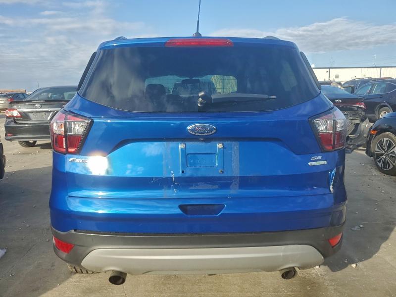Photo 6 from auction – 2018 FORD ESCAPE SE with VIN 1FMCU0GD1JUA84345