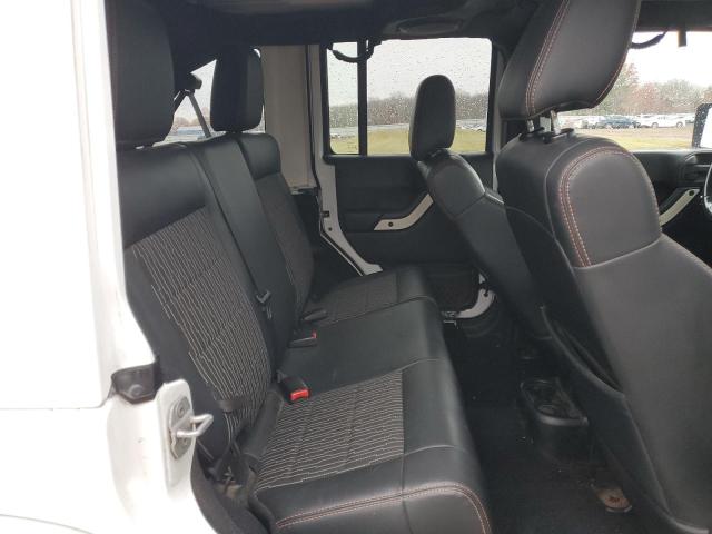 Photo 11 from auction – 2012 JEEP WRANGLER U with VIN 1C4BJWEG6CL146906