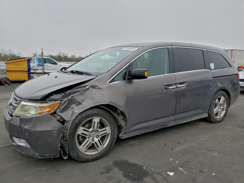 HONDA ODYSSEY TO 2012 with VIN 5FNRL5H94CB031823 - Photo from auction