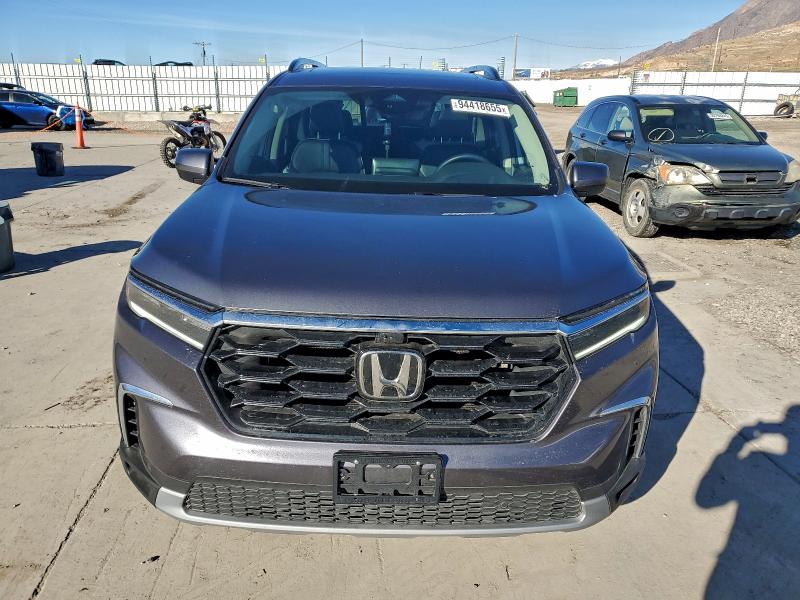 Photo 5 from auction – 2025 HONDA PILOT ELIT with VIN 5FNYG1H87SB060070