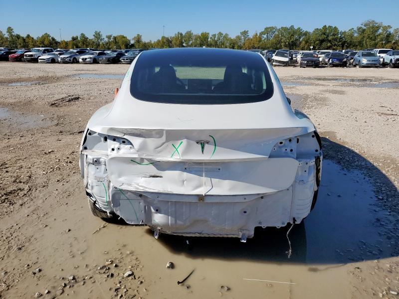 Photo 6 from auction – 2022 TESLA MODEL 3 with VIN 5YJ3E1EAXNF115381