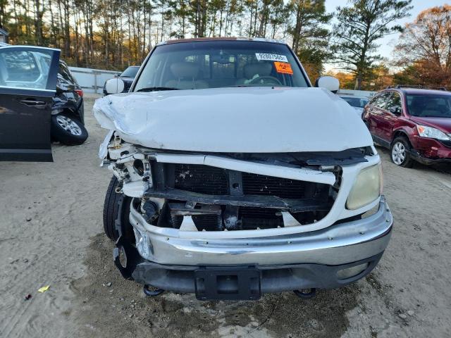 Photo 5 from auction – 2002 FORD F150 SUPER with VIN 1FTRW08L62KE36671