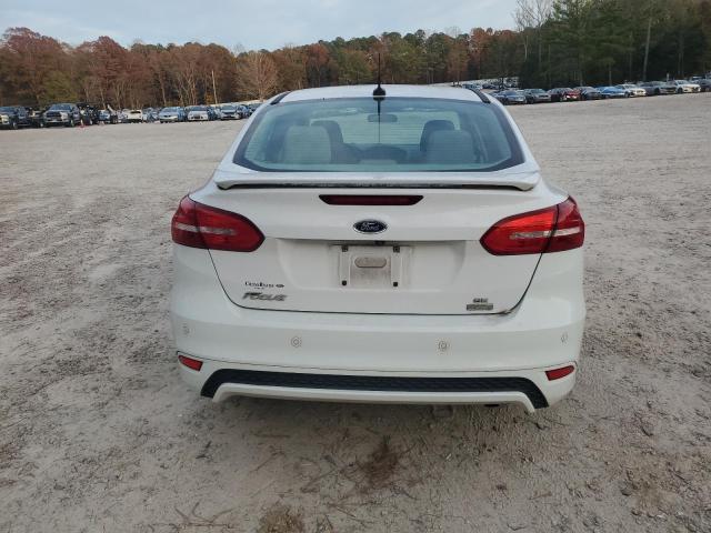 Photo 6 from auction – 2015 FORD FOCUS SE with VIN 1FADP3FE0FL321499