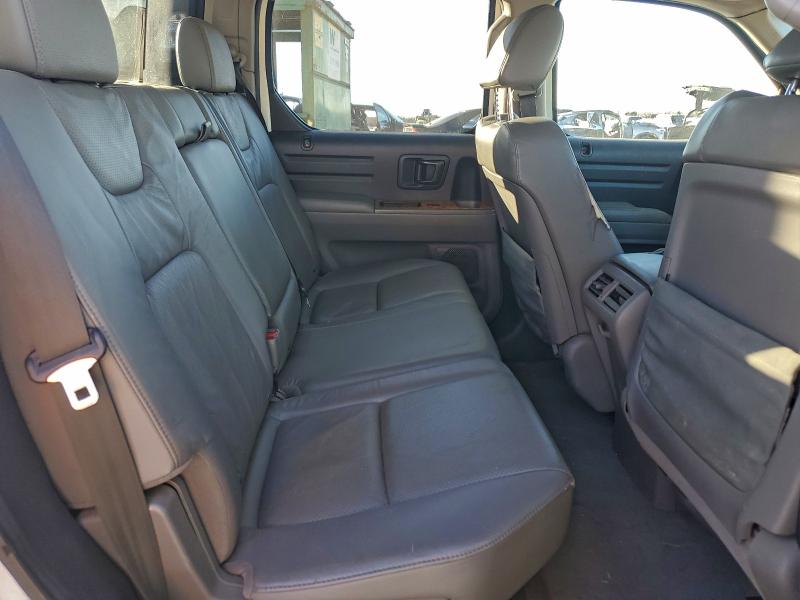 Photo 10 from auction – 2010 HONDA RIDGELINE with VIN 5FPYK1F50AB001245