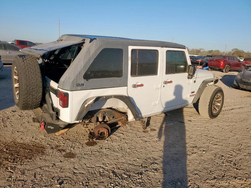 Photo 3 from auction – 2011 JEEP WRANGLER U with VIN 1J4BA3H16BL604829